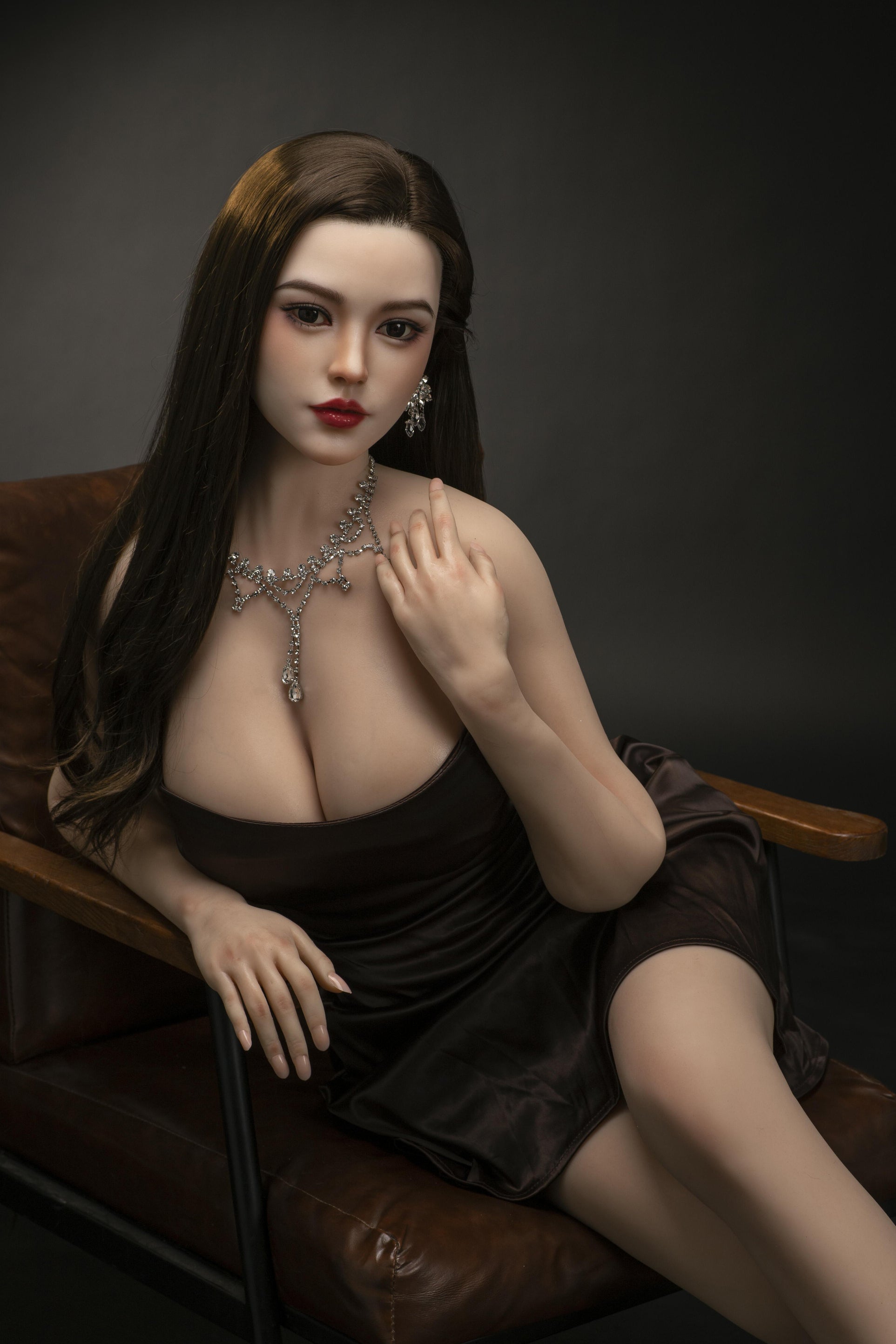 silicone sex doll in asian style on chair